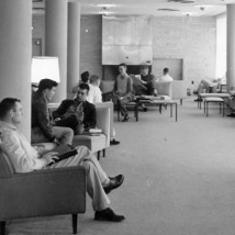 1960s students seated in open lounge area