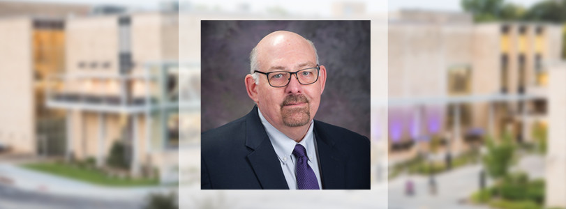 Craig Johnson headshot with the Union as the background