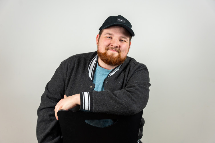 Riley Scott posed for self-portrait with doodles of "SCS" and a crown on top of his head